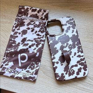 iPhone 16 pro max Loopy Case Brown and White Cow print